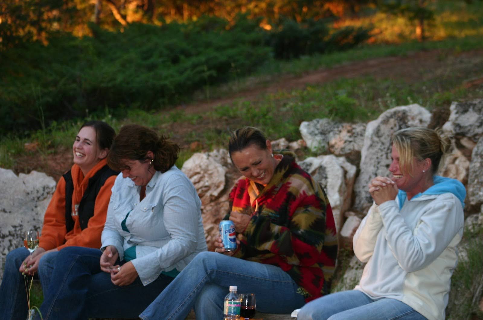 Riders galloping across stunning Wyoming wilderness