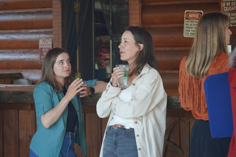 Guests talking together at the ranch