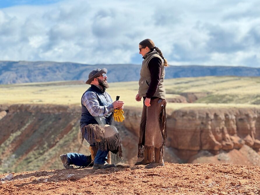 A couple celebrating in red-rock country